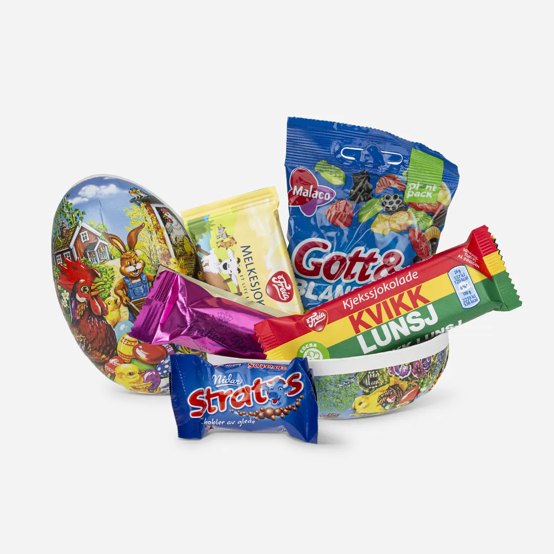 Påskeegg 12cm Klassikere - Innhold: Eventyr Melk 24g, Kvikk Lunsj 24g, Anthon Berg Marsipanbrød 25g, Stratos Bit Løsvekt 10g, Godt & Blandet 50g Et påskeegg delt i 2, fylt med påske klassikere