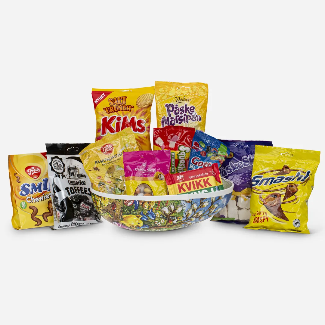 Påskeegg 30cm Innpakket 1kg - Innhold: Walkers Liqourice 119g, Smil Chewies 110g, Nidar Påske Marsipan 138g, Smash 100g, Påskeskum 100g, Anton Berg Mandelegg 80g, Påskekompiser 120g, Kim Salt Crunch 30g, Kvikk Lunsj 47g, Godt & Blandet 160g, Squashies Drumstick 60g Påskeegg 30cm Innpakket 1kg