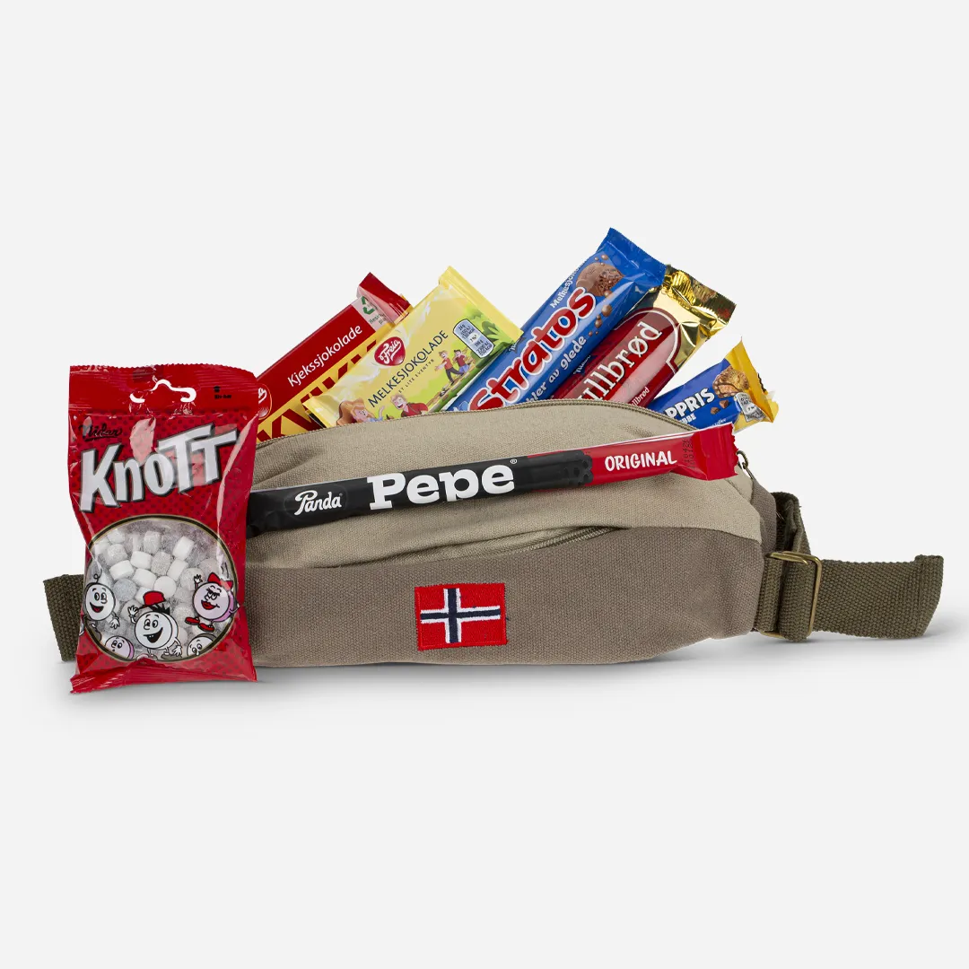 Taskeladden påske - Innhold: Retro Rumpetaske, Knott 80g, Panda lakris stang 32g, Kvikk Lunsj 47g, Gullbrød 50g, Stratos 42g, Eventyr melkesjokolde 24g, Toppris 30g. Taskeladden påske