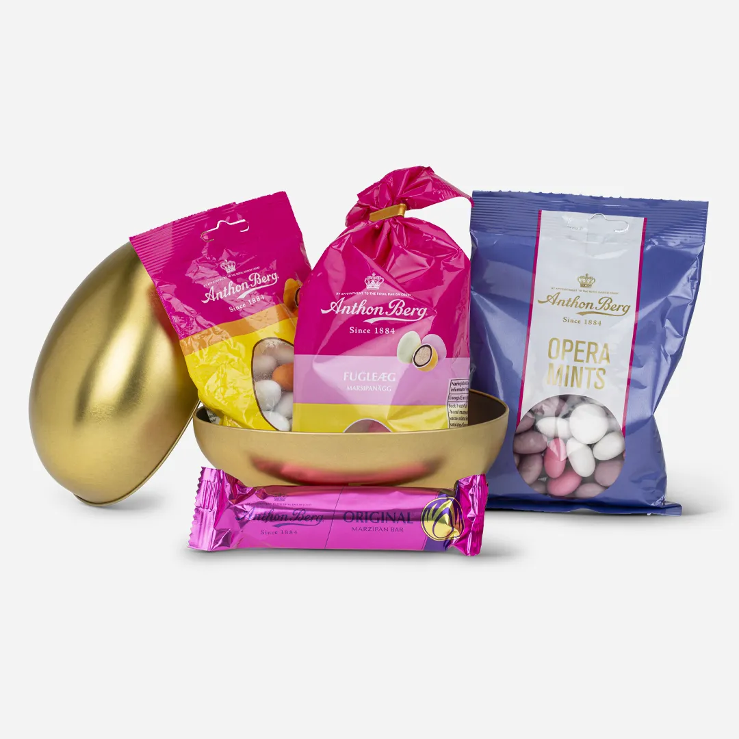 Gullegg 18cm Anthon Berg Spesial - Innhold: Anthon Berg Opera Mints 140g, Anthon Berg Fugleegg / Marsipanegg Påske 80g, Anthon Berg Mandelegg 80g pose Påske 80g, Anthon Berg Marsipanbrød 25g Gullegg delt i to, fylt med marsipan og mer