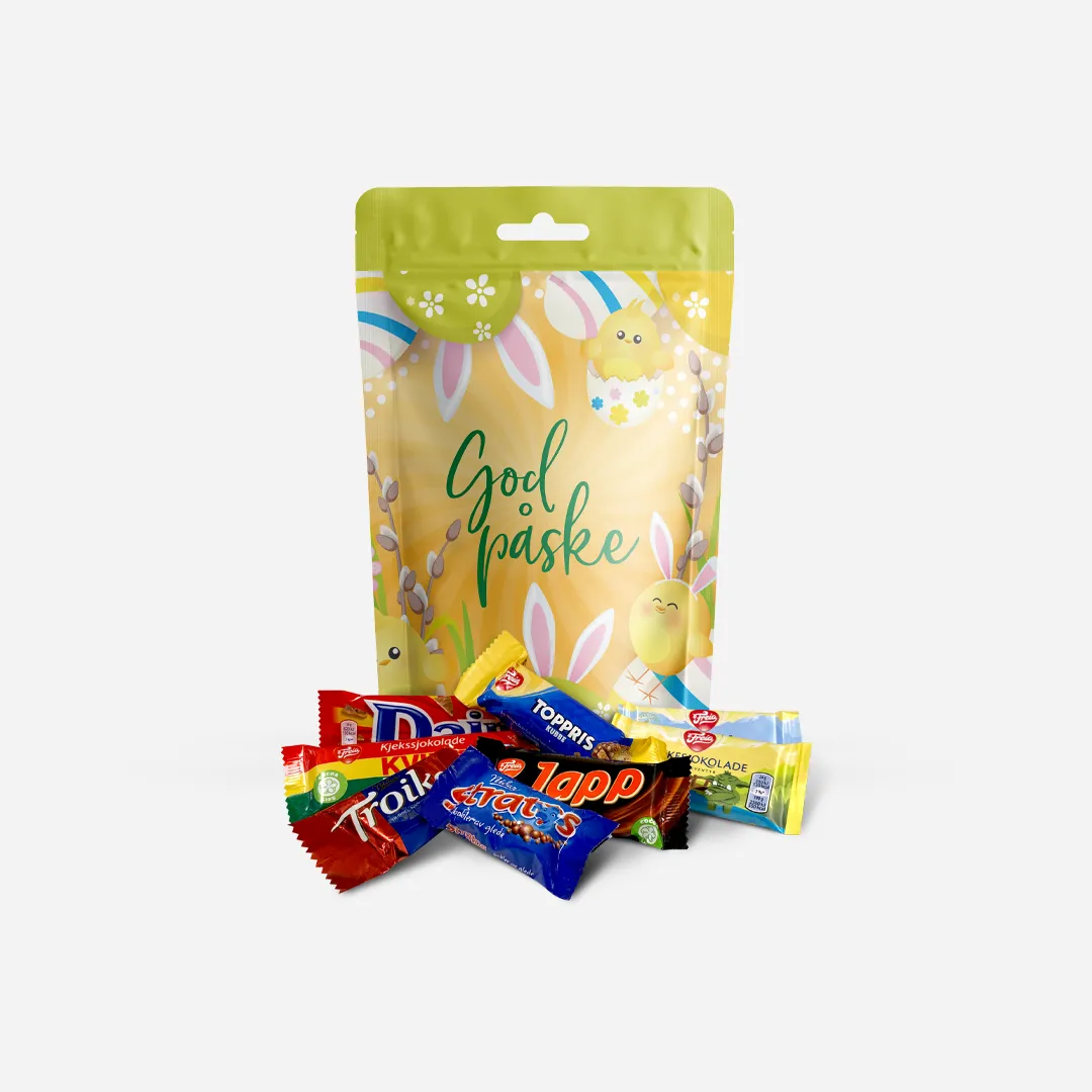 Norske Sjokoladeklassikere - Innhold: Kvikk Lunsj, Daim, Japp, Toppris, Melkesjokolade eventyr, Firkløver, Stratos, Troika 420g En fin pose med påskedesign, forran posen er innholdet avbildet