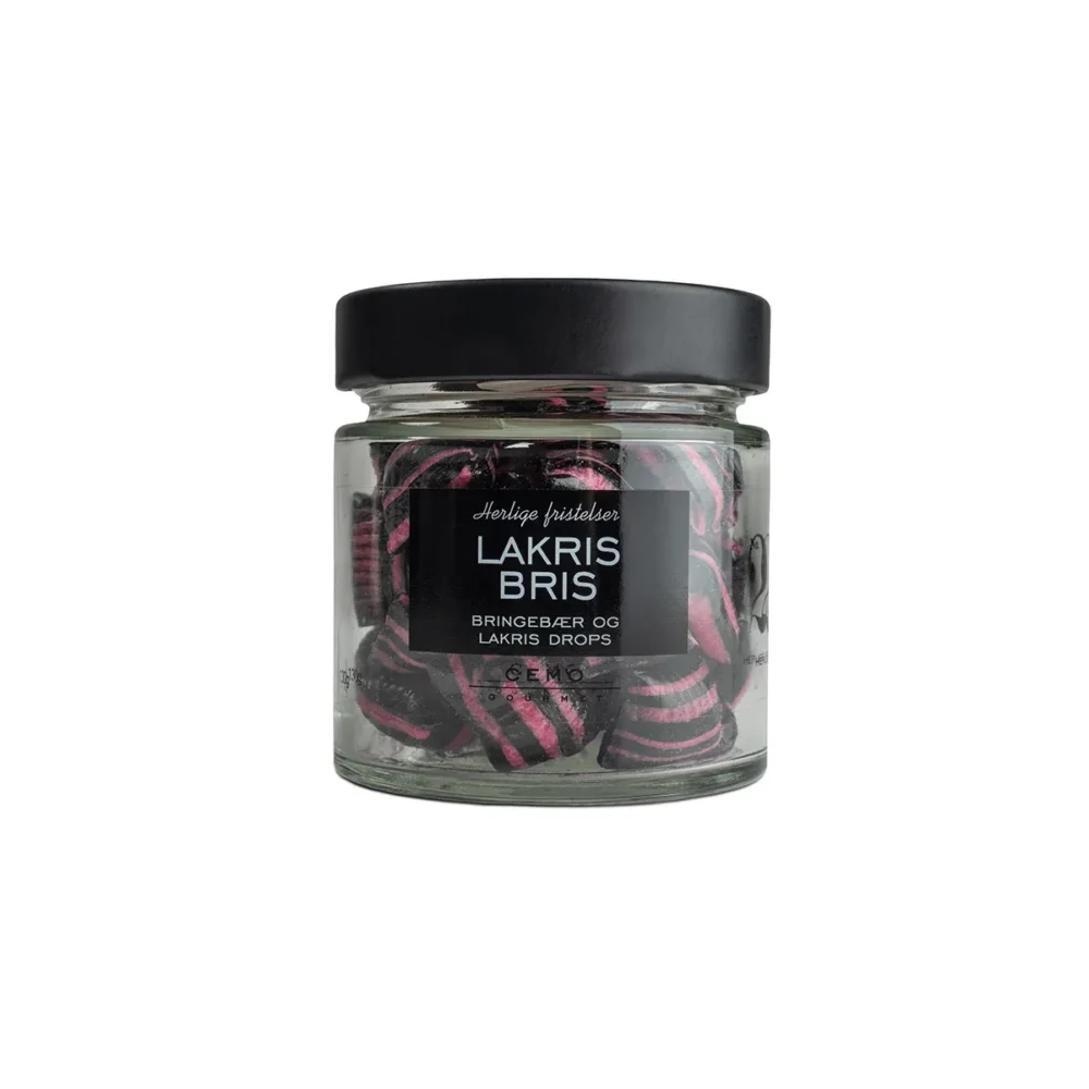 Lakrisbris (historisk) - En spennende blanding av søte bringebær og lakris, perfekt balansert i hvert drops. En frisk og unik smakskombinasjon som garantert vil falle i smak. Gjennomsiktig glass med sort lokk. Glasset er fylt med lakris