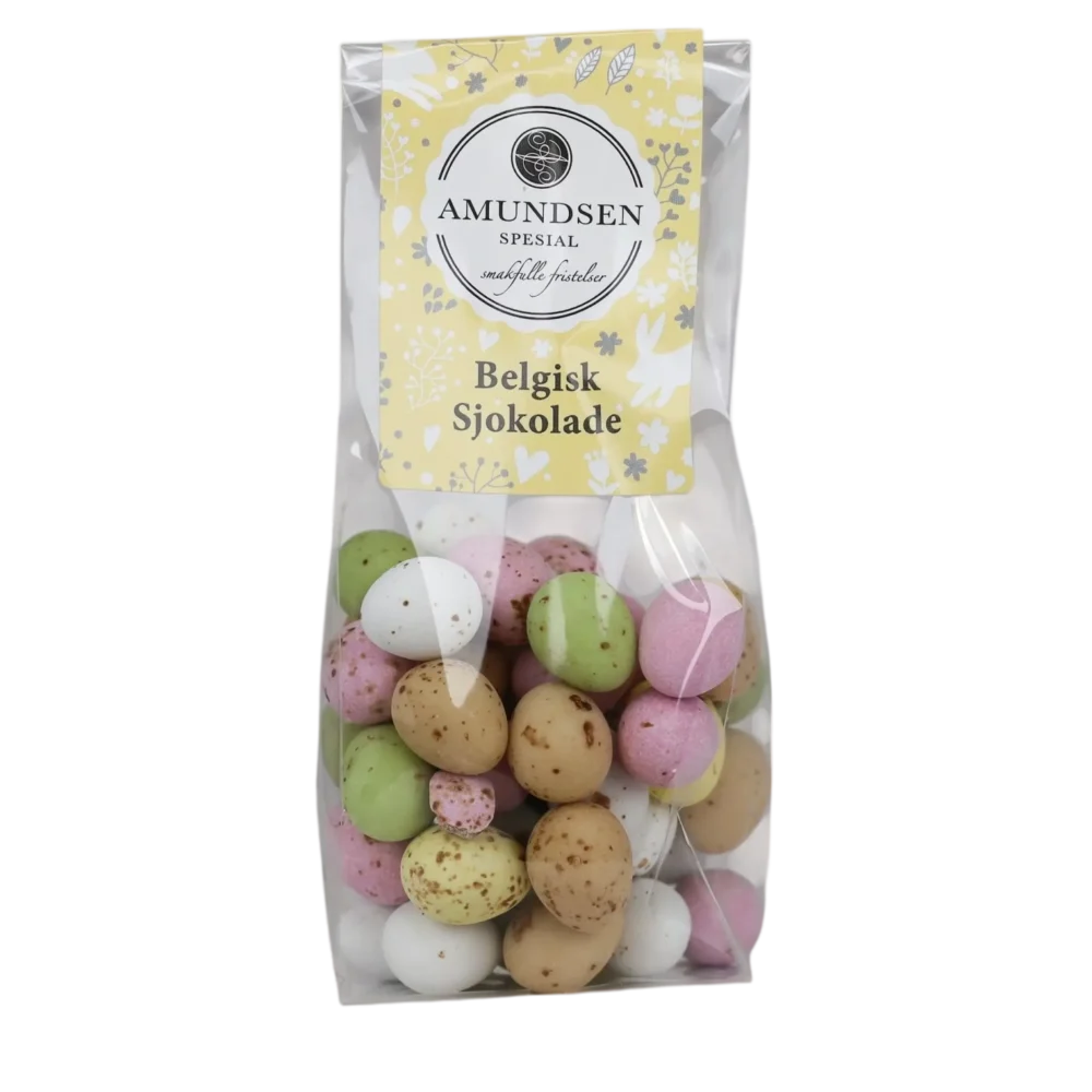 Sjokoladeegg I Pose - Gjør påsken ekstra spesiell med våre fargerike mini sjokoladeegg – en utsøkt kombinasjon av smak og estetikk som vil bli husket. Belgiske sjokoladeegg i pose